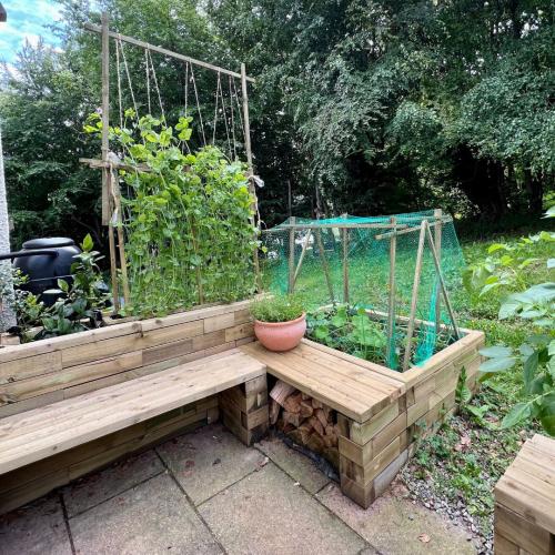 Adie’s raised planter bench patio