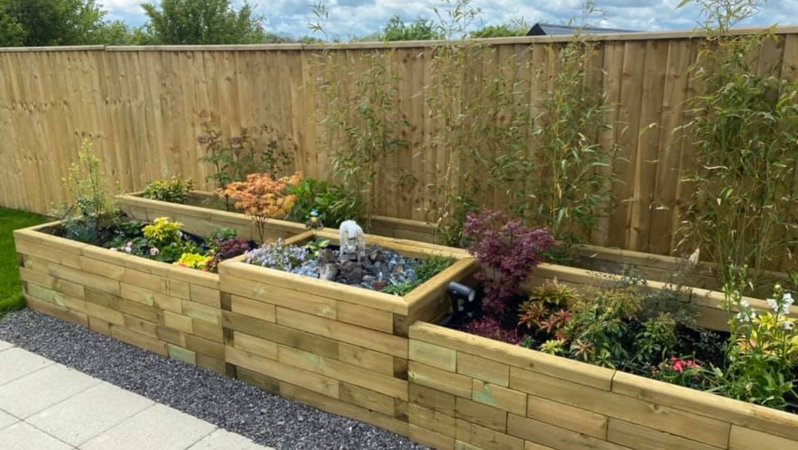 Adding a water feature to a raised bed